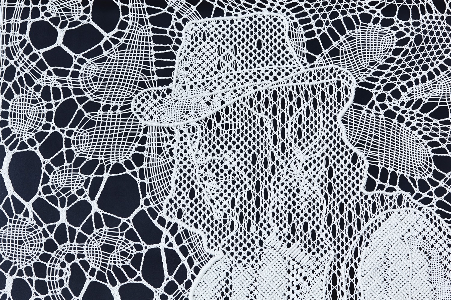 Pierre Fouché. Brett posing for an imaginary portrait of Raymond Buys (2015). Bobbin lace and macramé in polyester braid. 265 x 140cm. Private collection.
